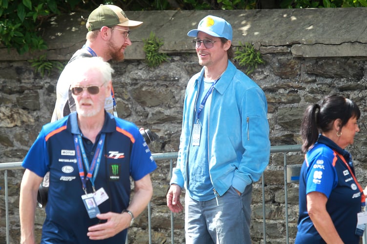 Brad Pitt smiling at the Isle of Man TT (Photo: Tom Curphey/Media Isle of Man)