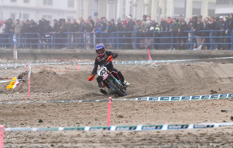 Daniel McCanney aboard his 450 KTM in front of a large crowd on his way to winning Peveril MCC’s beachcross on Monday evening (Photo: Moddey Dhoo Media)