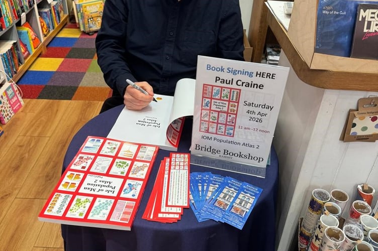 Paul Craine at a book signing for Isle of Man Population Atlas 2