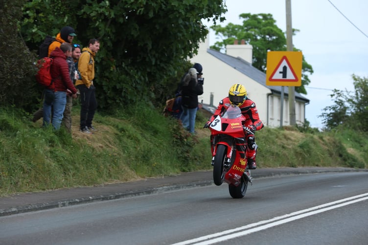 Michael Dunlop coming over Crosby Hill on the replica Honda SP1