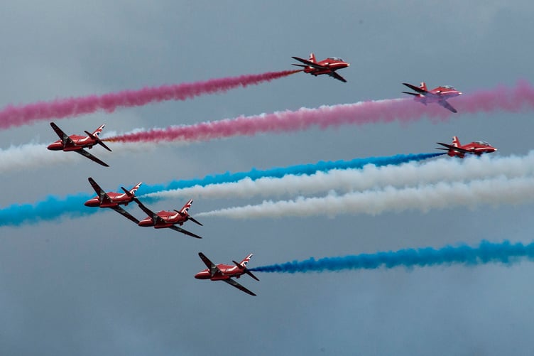 The aircraft left trails of red, white and blue smoke as they carried out a variety of precision formations and aerobatic routines (Photo: Sue Jones)