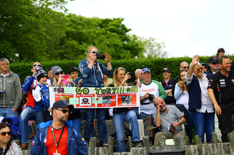 Yuki enjoys capturing personal moments of the TT such as families supporting riders