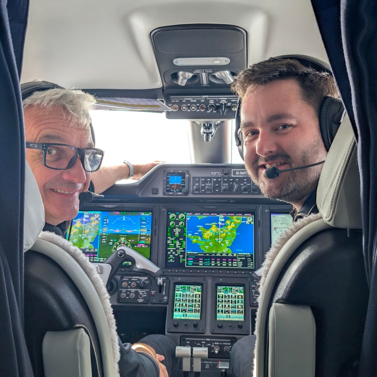 Naljets' Craig McLeod and Jon Rasmussen in the cockpit of the Phenom 300 executive jet
