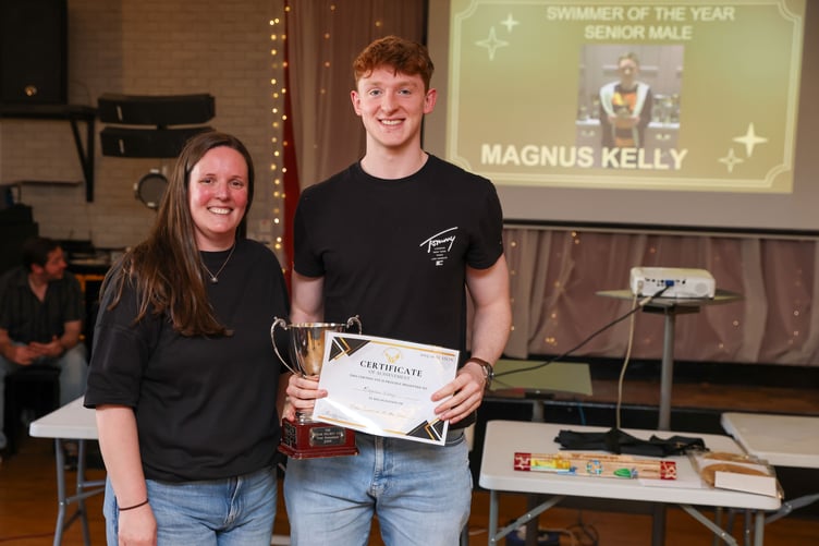 Magnus Kelly is awarded male swimmer of the year