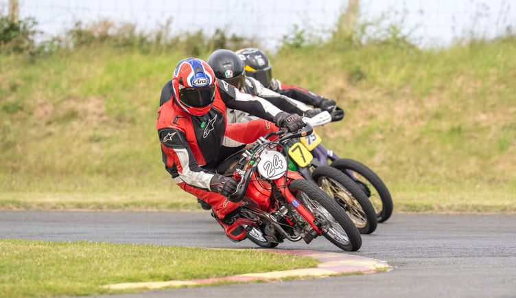 Nigel Woods on the lone C90 gets the inside line at one of the corners during Sunday's meeting at Jurby (Photo: Hagar Photography)