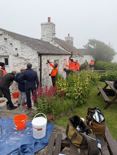 Volunteer Community Rangers taking part in the recent limewash workshop at Cregneash
