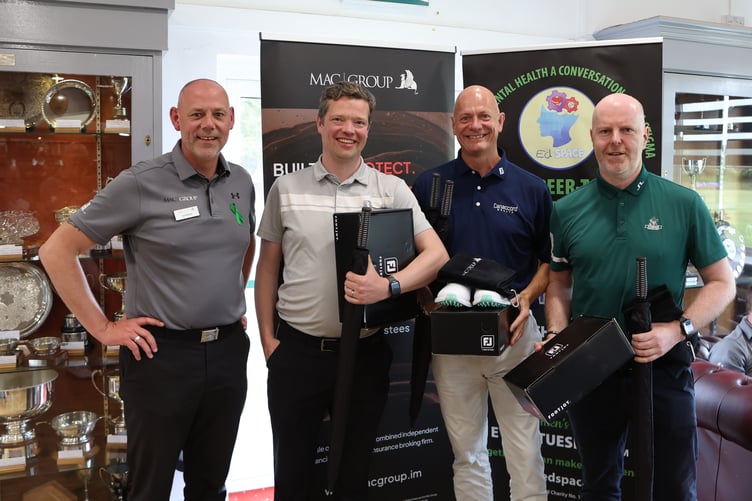 MAC Group's Ed Walter (left) with the winning Canaccord team from the Douglas firm's recent charity golf day