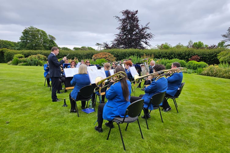 Onchan Silver Bank performs in the grounds of Government House