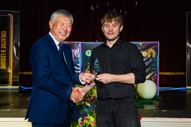UCM Student of the Year Harley Cowley – award being presented by UCM Chair of Governors Leslie Wong