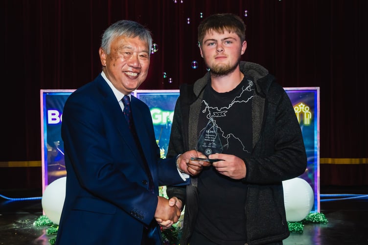 UCM Apprentice of the Year James Smith – award being presented by UCM Chair of Governors Leslie Wong