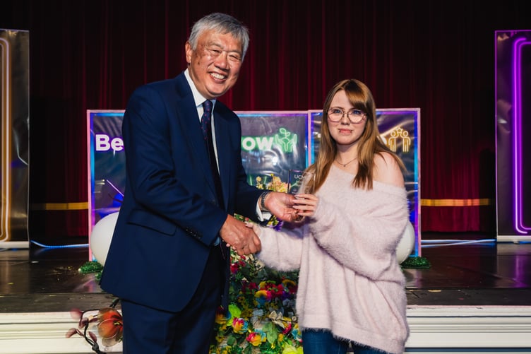 Holly Bashforth award being presented by UCM Chair of Governors Leslie Wong