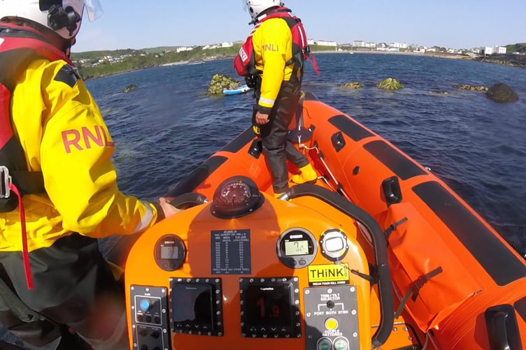 Port Erin RNLI assisting two paddleboarders on Thursday afternoon