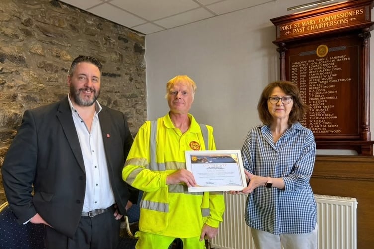Left to right: Clerk to the Board of Port St Mary Commissioners Mark Kemp, street cleaner Shay Pemberton and Chairman of the Commissioners Jean Teare