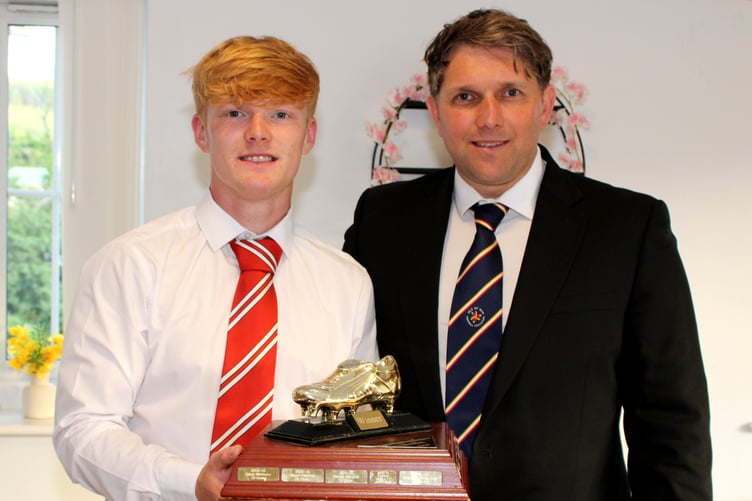 Tomas Brown (left) receives the Premier League Golden Boot award from Isle of Man FA chief executive officer Lewis Qualtrough (Photo: Paul Hatton)