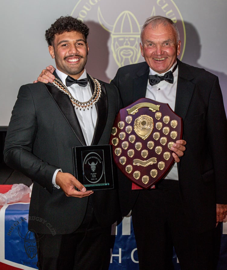 Josh Campbell receives the Player of Year award from ex-Douglas captain Tim Manning. Campbell was also named Players Player of the Year at the presentation (Photo: Richard Ebbutt)