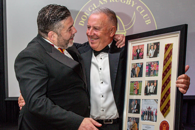 Gareth Hooson-Owen (left) stepped down at the awards after a 17-year presidential tenure. He's pictured receiving a framed montage covering his successful years from club chairman John Gelling (Photo: Richard Ebbutt)