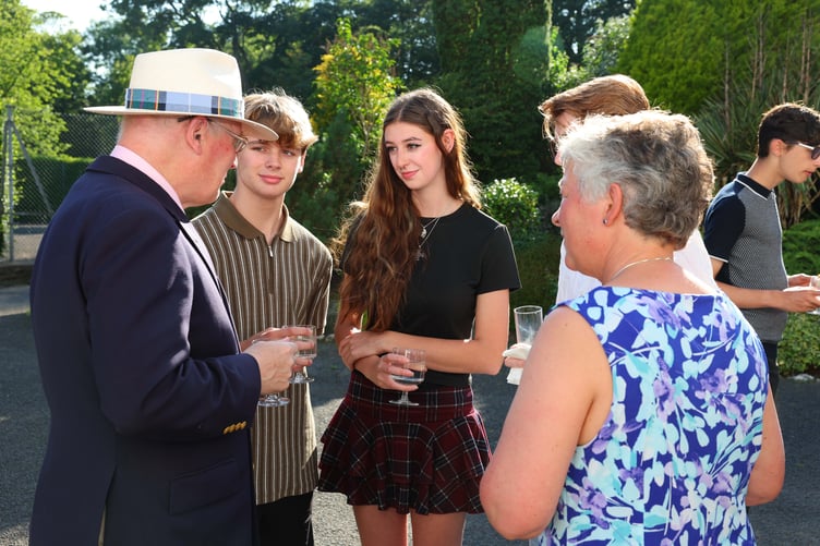 The Lieutenant Governor Sir John Lorimer and Lady Lorimer engage in conversation