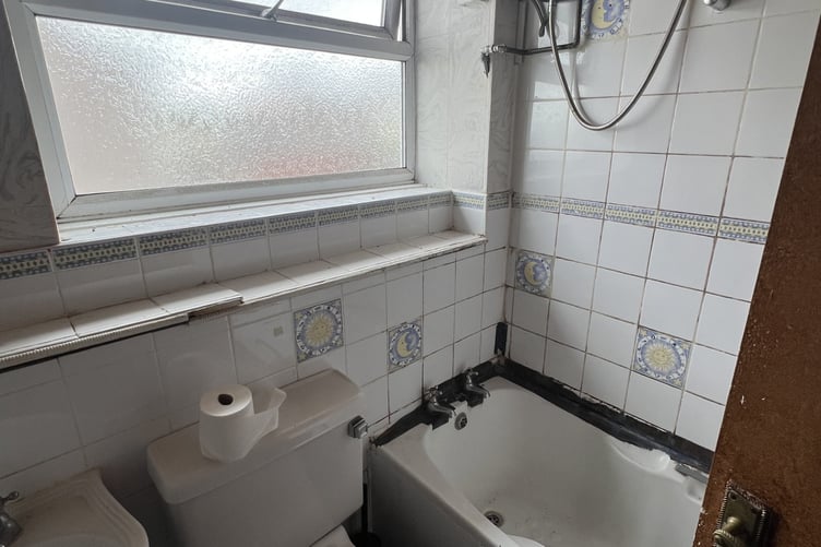 The bathroom is in clear need of modernisation