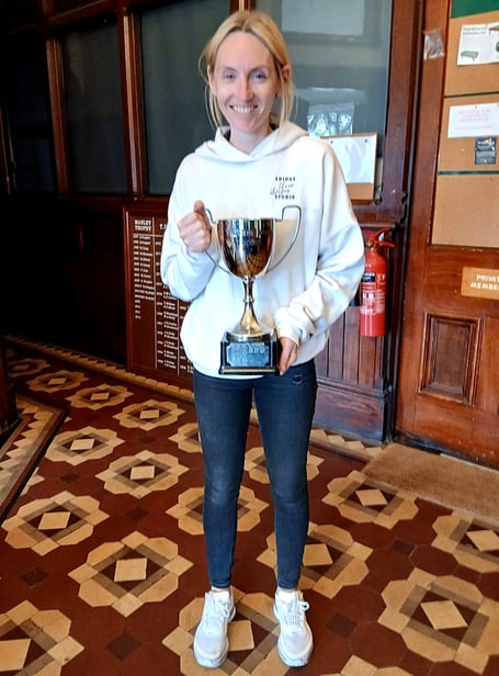 Women’s merit winner Jenny Moore with the Barbara Lee Trophy