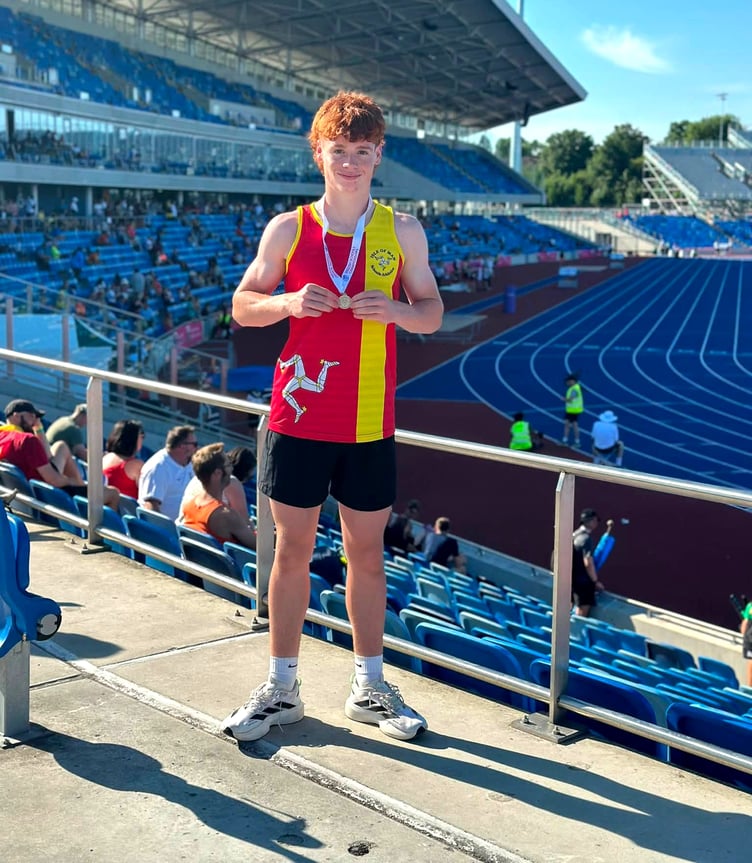 Taylor Kneen with his silver medal at the English Schools Track and Field Championships at the Alexander Stadium in Birmingham