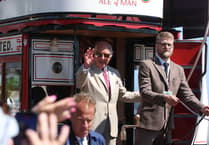 In pictures: Crowds welcome King Charles as he rides island's iconic horse trams