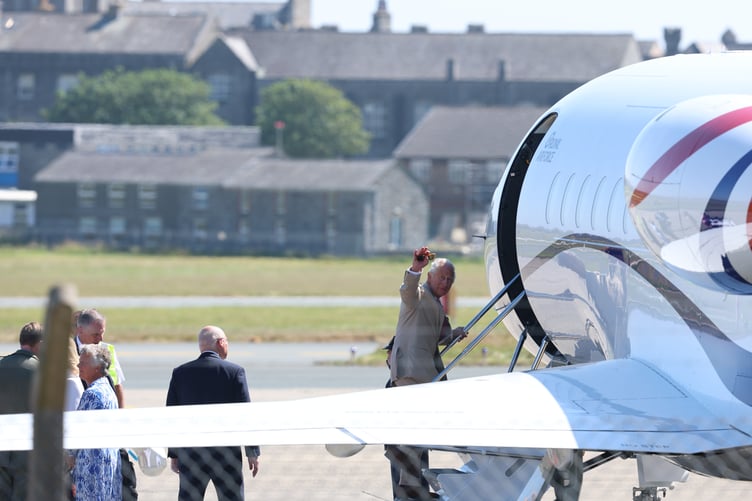 King Charles says goodbye as he boards the plane back out of the Isle of Man