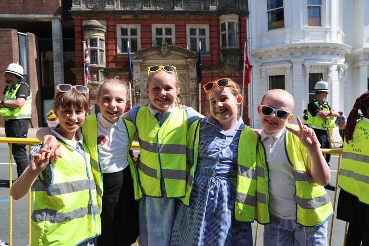 Pupils from primary schools around Douglas eagerly waited on the Kings arrival