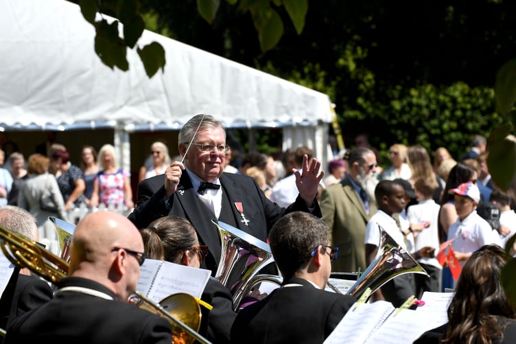 King Charles III was greeted by live music