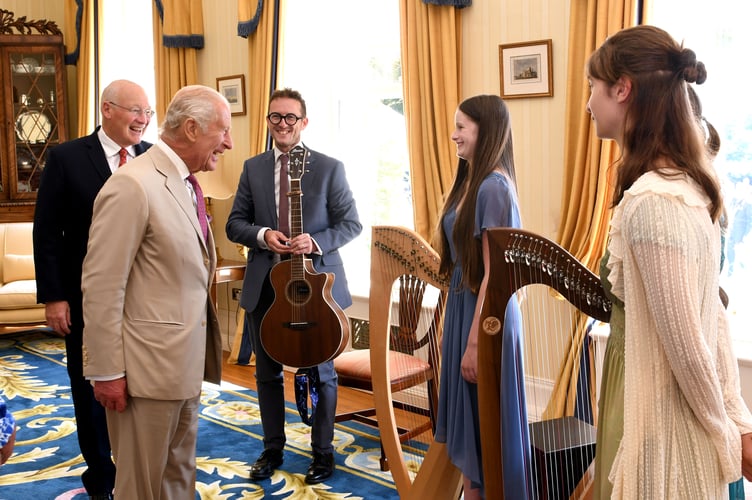 His Majesty meeting local harpists in Government House