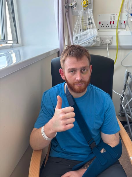 Injured Southern 100 rider Grant Thomson is back home in the island after his spill at last week's event