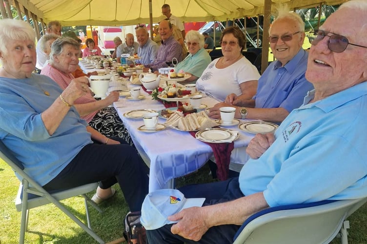 Legends of the parish hide from the sun!