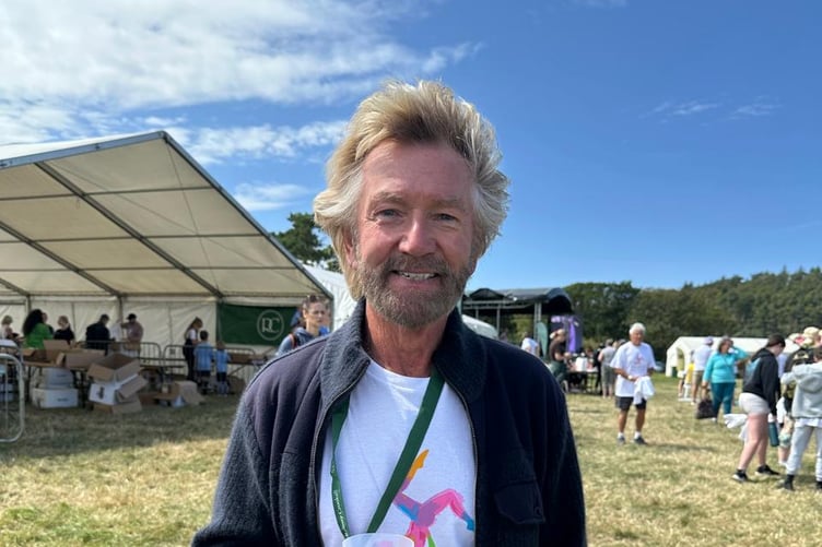 Noel Edmonds enjoying himself at the island's Pilates World Record Attempt at Knockaloe on Sunday afternoon (Photo: Media Isle of Man)
