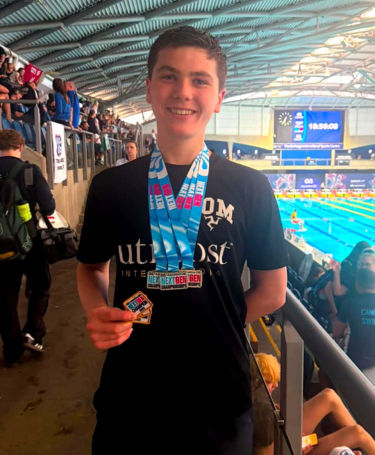 Isle of Man swimmer Oscar Maddrell with his three medals after an historic few days at the Aquatics GB Next Gen Championships in Sheffield