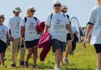 Community spirit triumphs at record-breaking Pilates gathering