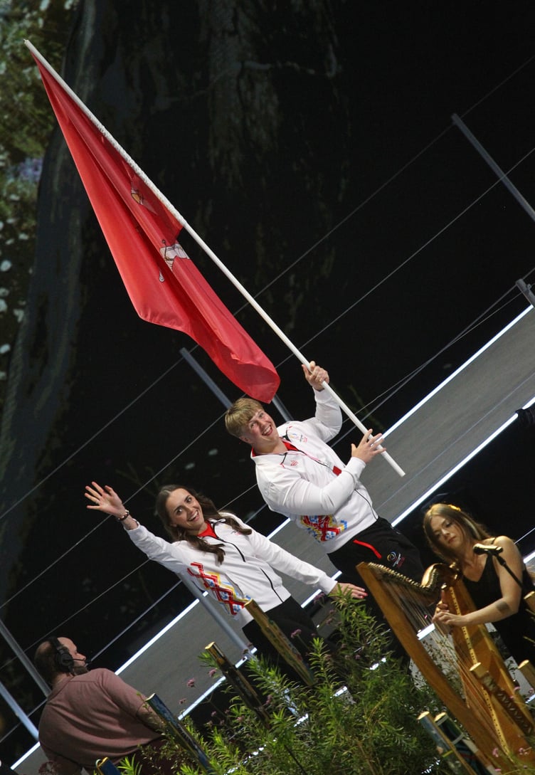 Flag bearer Alfie Bezance and baton bearer Laura Kinley lead Team Isle of Man onto the stage in the opening ceremony of the 2026 Commonwealth Games in Glasgow on Thursday evening (Photo: Dave Norton)