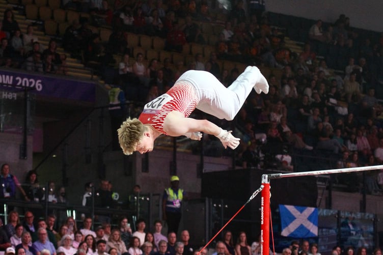 Manx gymnast Harry Eyres dismounts horizontal bar during the all-round artistic gymnastics competition at the Commonwealth Games on Friday (Photo: Dave Norton)
