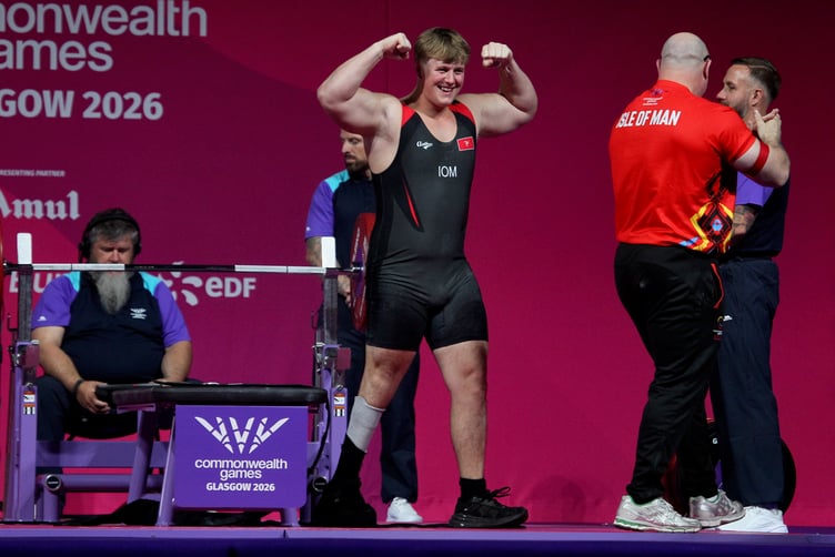 Isle of Man para-powerlifter Alfie Bezance celebrates after completing his third clean lift during the men's heavyweight final at the Commonwealth Games in Glasgow on Friday evening (Photo: Dave Norton)