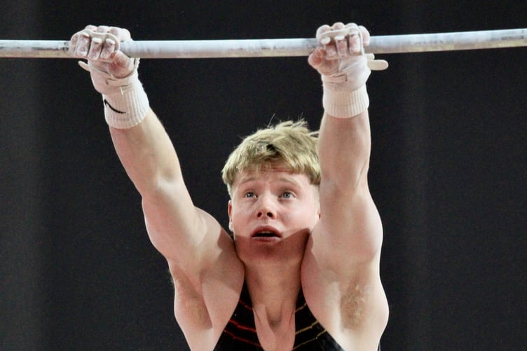 Harry Eyres on the horizontal bars apparatus (Photo: Dave Norton)