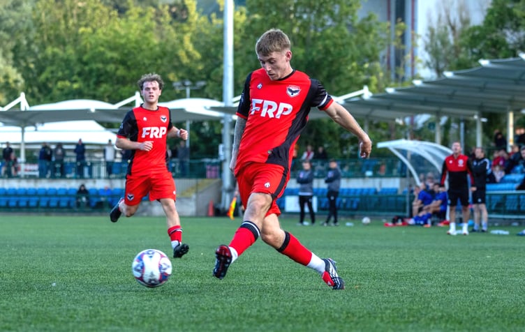 Joe Quayle - seen here in action against FC St Helens in last weekend's season opener - helped FC Isle of Man maintain their unbeaten start against Glossop North End on Tuesday (Photo: Hannah McHugh)