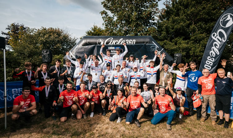 The various winners in the Lloyds British National MTB Enduro Championships which were held in the island last weekend, pictured alongside some of the organisers (Photo: Ricciardi Media)