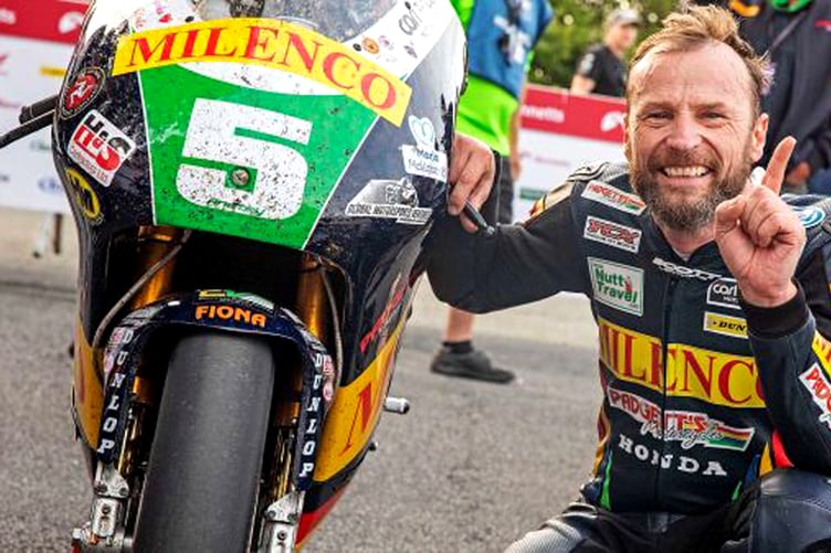 Bruce Anstey with the 250cc RS Honda that he rode to victory in three Lightweight Classic TT races between 2016 and 2019. Michael Dunlop will ride the machine at this month's meeting (Photo: www.iomttraces.com)