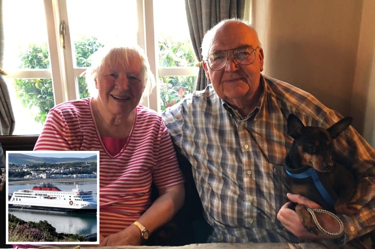 Chris and Joe Duffy with their pet dog Tito; inset, the out-of-action flagship vessel Manxman