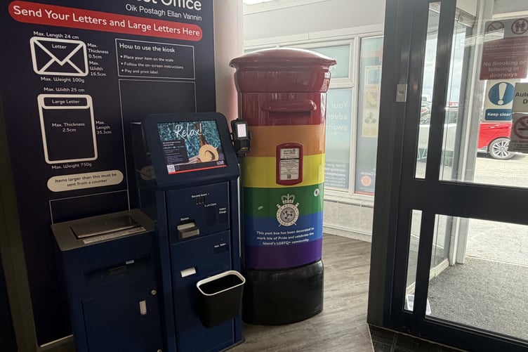 The rainbow-coloured post box at the Sea Terminal