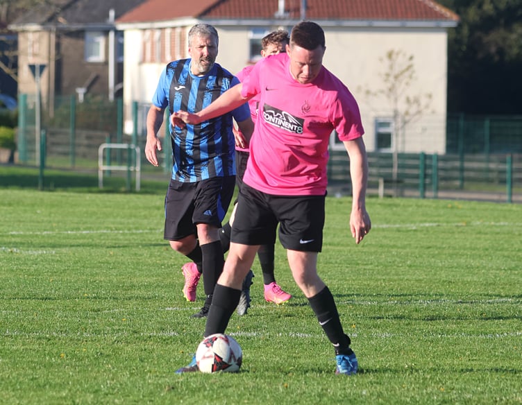 Will Penhallurick in action for Douglas Athletic who have joined forces with Gymns for the 2026-27 season and will play their home games in Tromode (Photo: Paul Hatton)