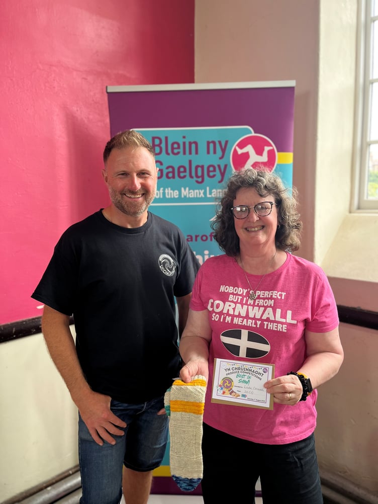 Best in Show winner Linda Carswell pictured with event sponsor and committee member Adam Horne from Digital Group Isle of Man