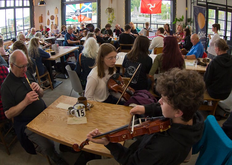 A lunchtime food and folk session at Noa Market Hall as part of Yn Chruinnaght 2026 (All photos: Val Caine, Jiri Podobsky, Becky McSevney and Chloe Woolley)