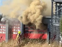 Explosions heard as 'major' fire rips through site