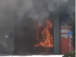 Road shut as blaze rips through fire station