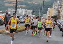 Parker and Colburn split by one second in half-marathon series