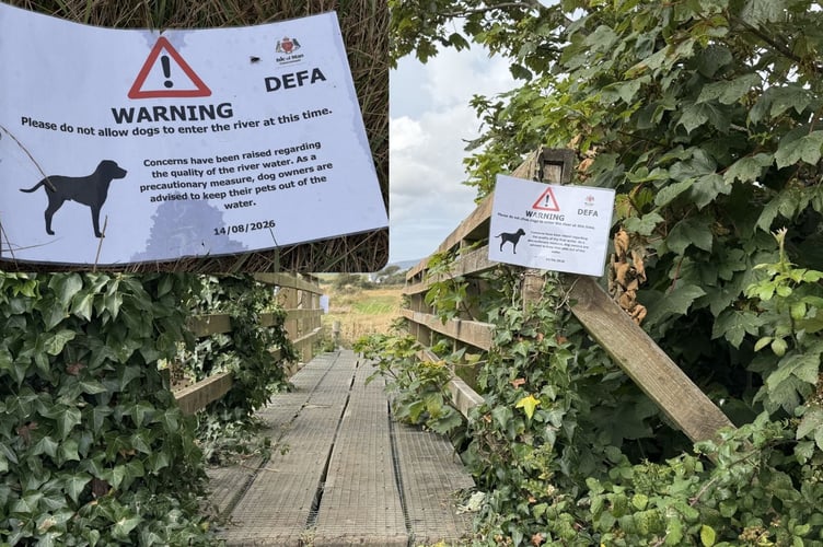Warning signs have been placed on walkways by the side of the Silverburn River urging people not to let dogs in the water